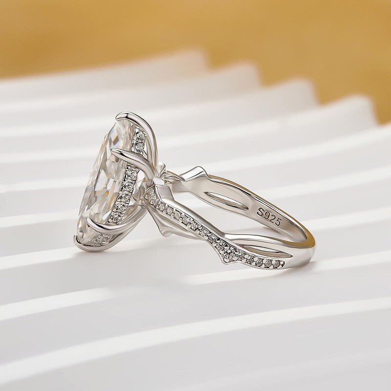 Moissanite 3.0Ct Marquise Cut Twist Engagement Ring In Sterling Silver