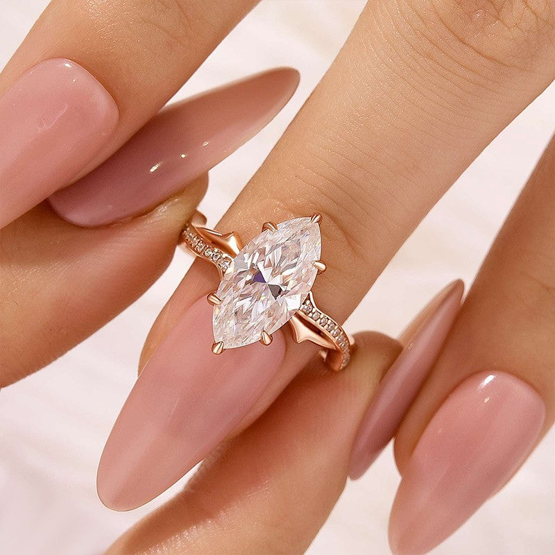 Moissanite 3.0Ct Marquise Cut Twist Engagement Ring In Sterling Silver